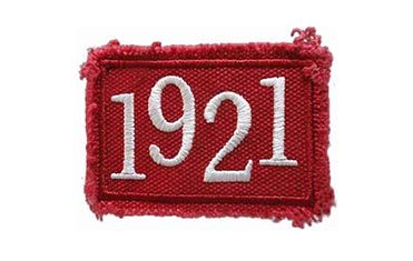 red custom embroidered patch with frayed edges